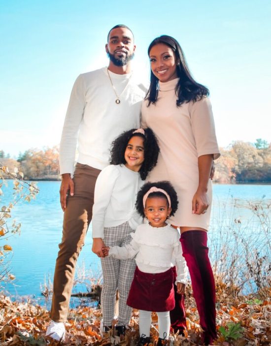 Natalya with her husband Mark and their daughters Londyn and Mia.